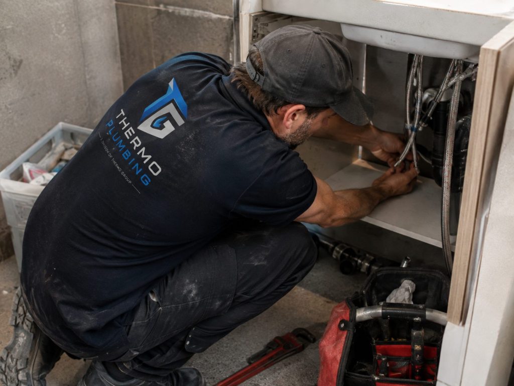 Thermo Plumbing technician carrying out plumbing work in Cape Town